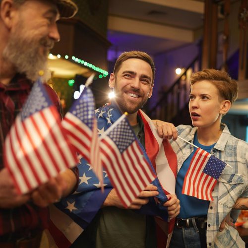 people-with-american-flags-in-the-bar-XCXLVJB.jpg